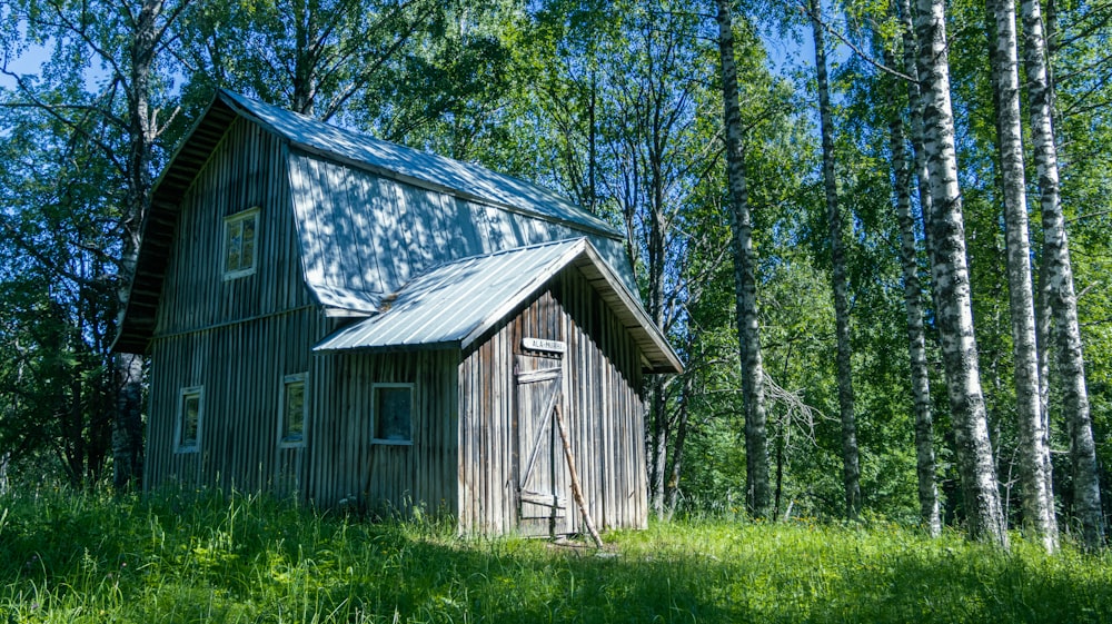 a wooden house in the woods