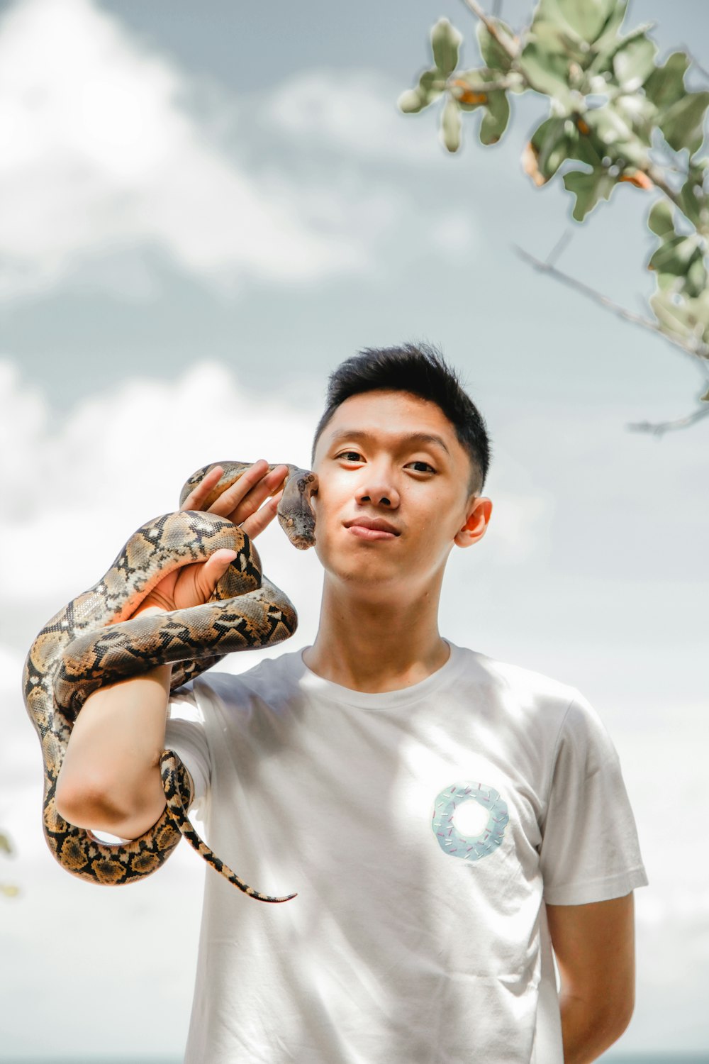 a person holding a snake