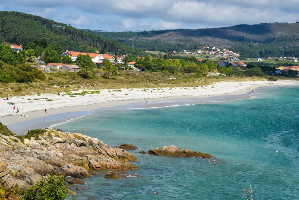 a beach with people on it