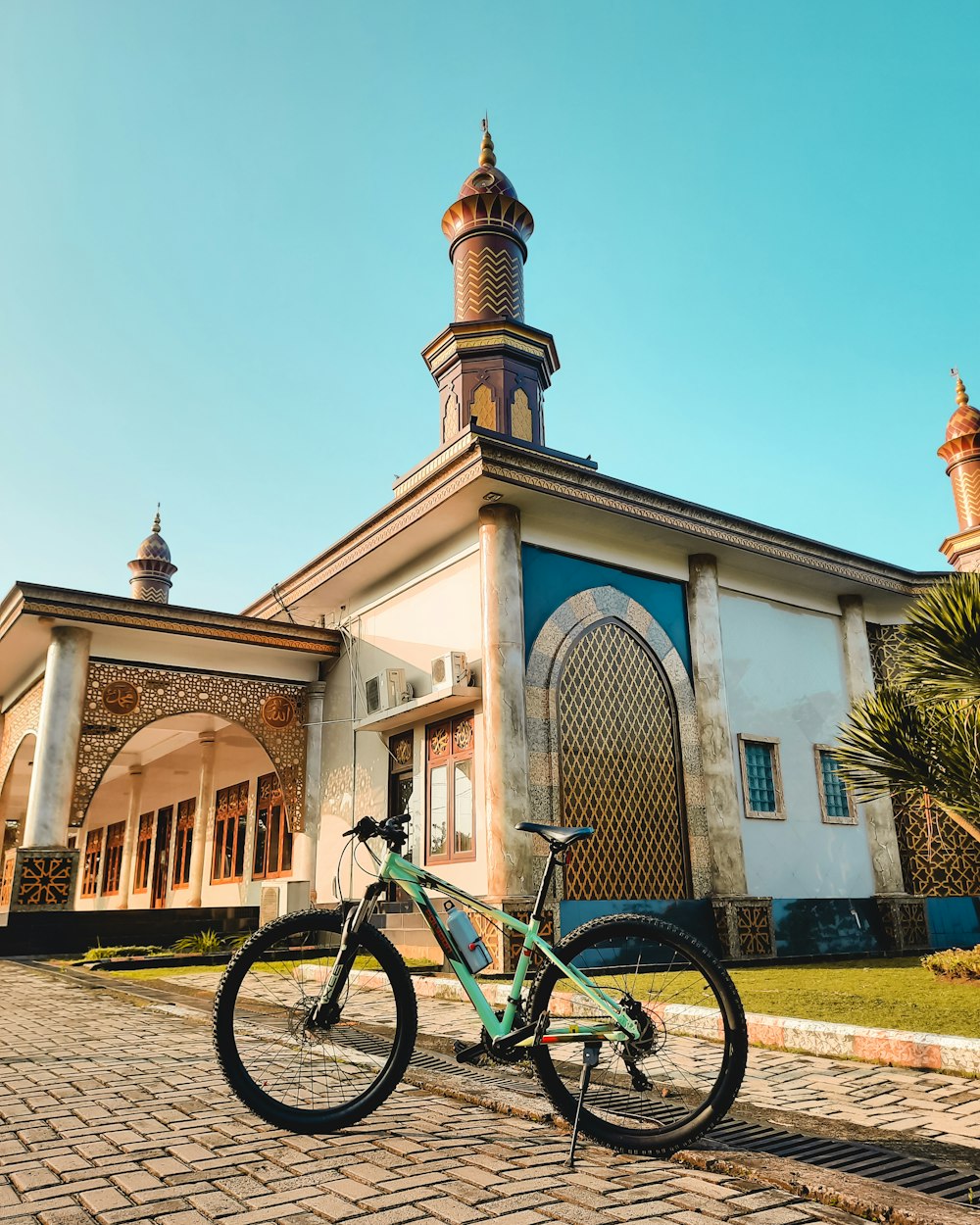 a bicycle parked in front of a building