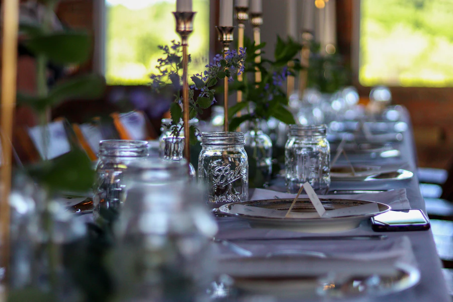 Plates and glassware set out for guests