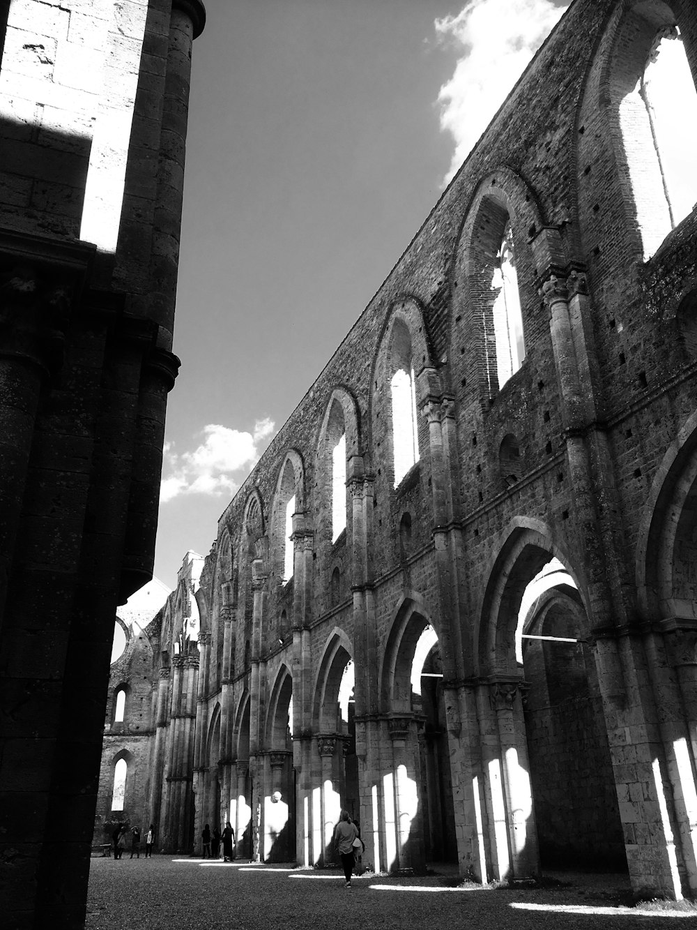 a stone building with arched windows