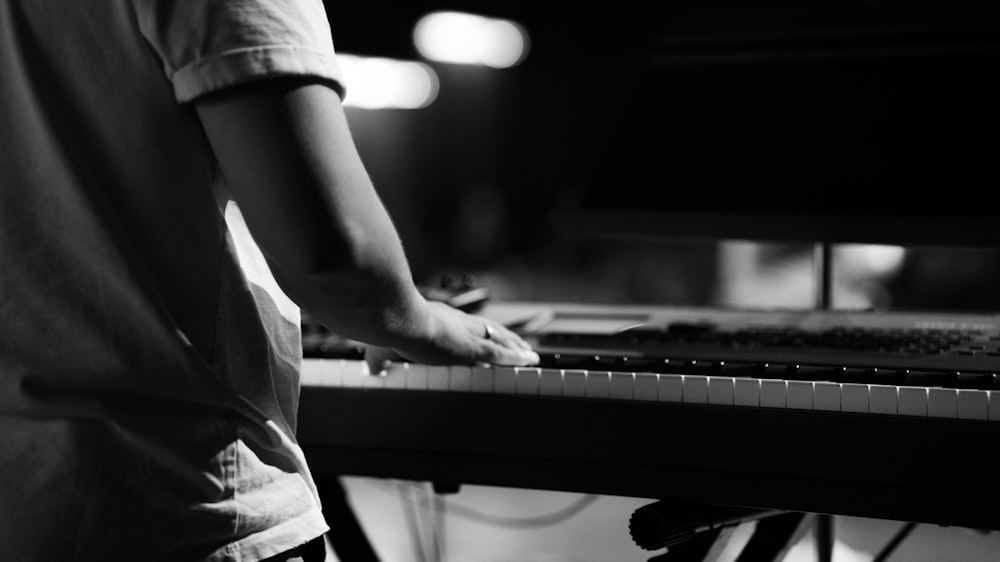 a person playing a piano