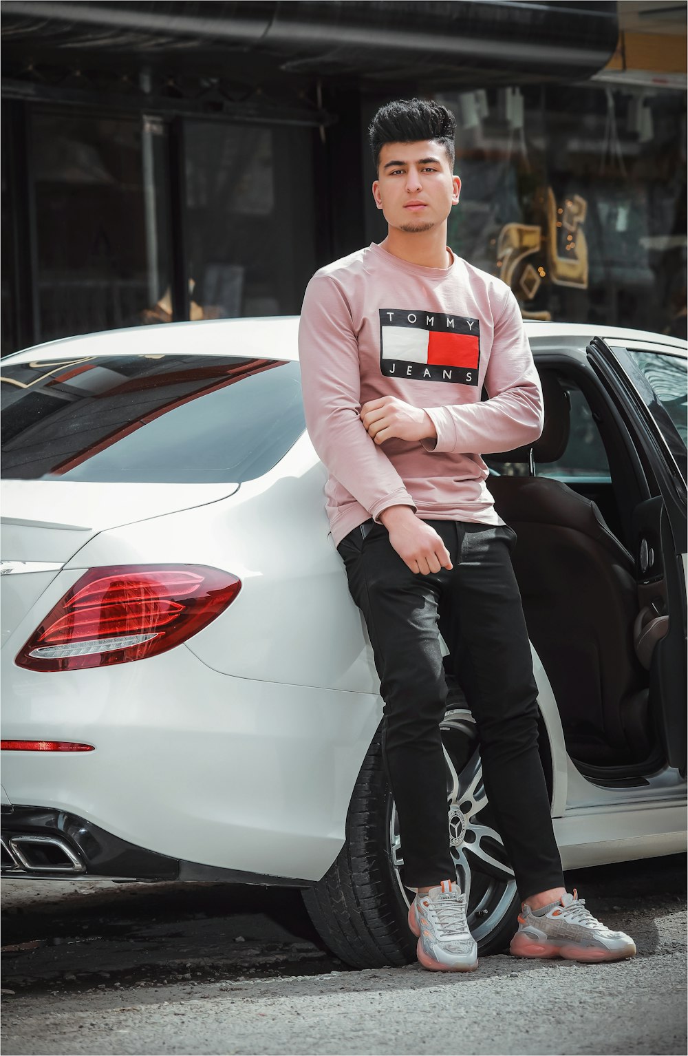 a person sitting on a car