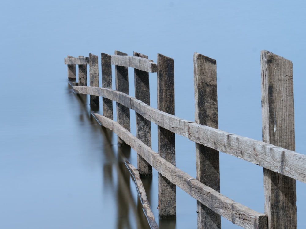 a wooden dock over water