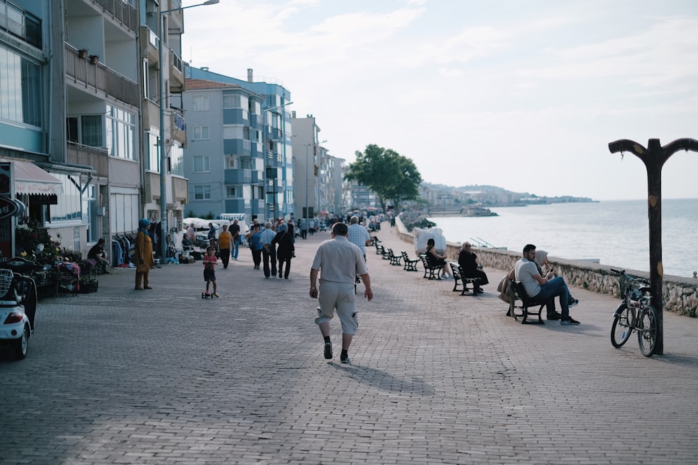 a group of people walking down the street