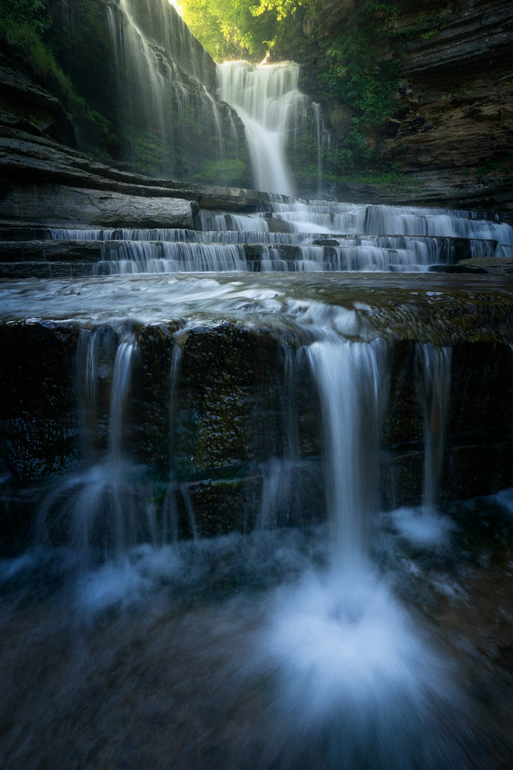 a waterfall into a body of water