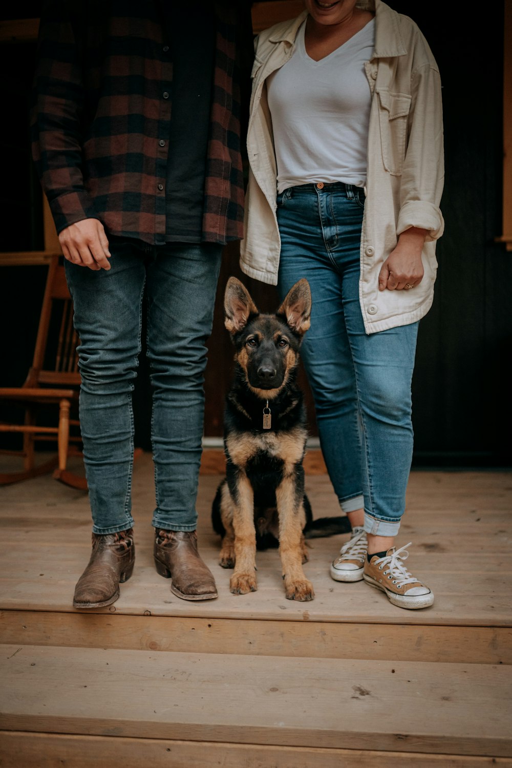 a person and a dog posing for the camera