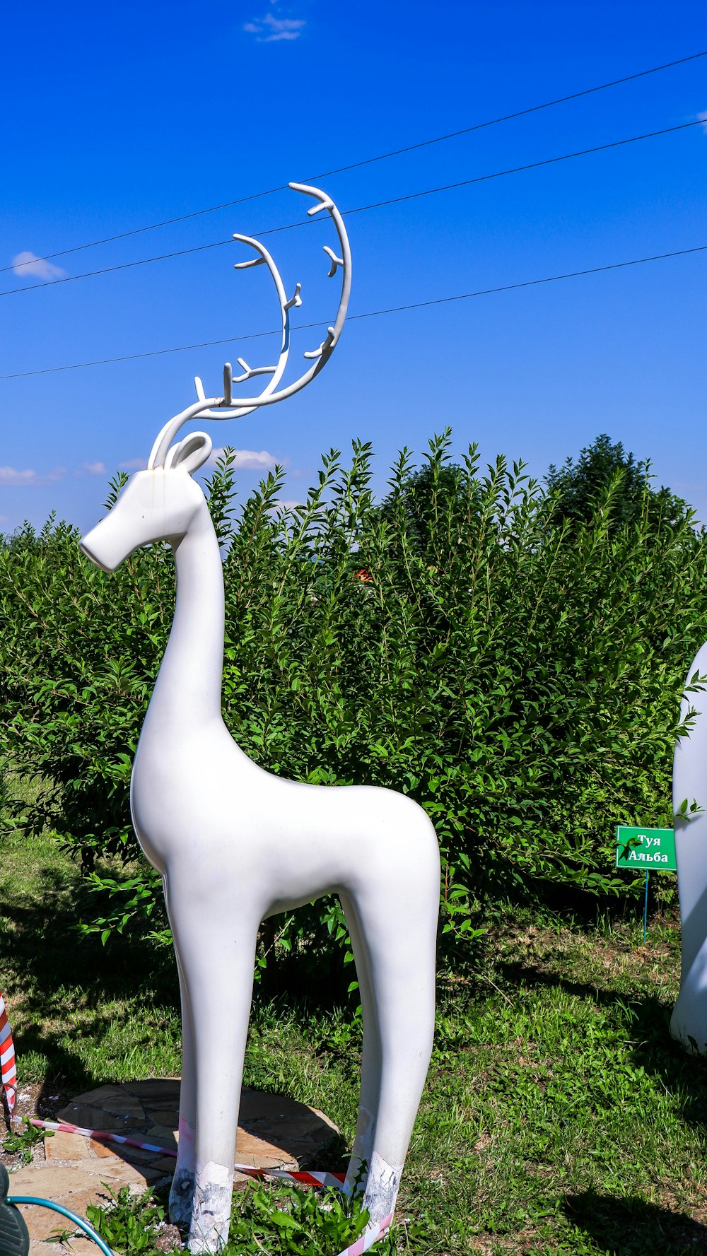 a white statue of a bird