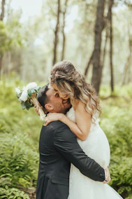 a man and woman kissing