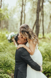 a man and woman kissing