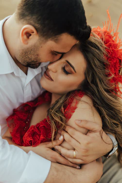 a man and woman kissing