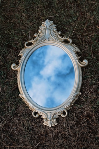 a glass bowl with a blue liquid in it