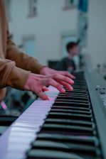a person playing a piano