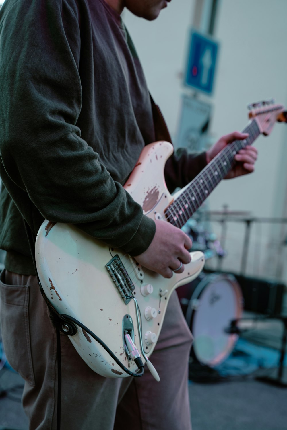 a person playing a guitar