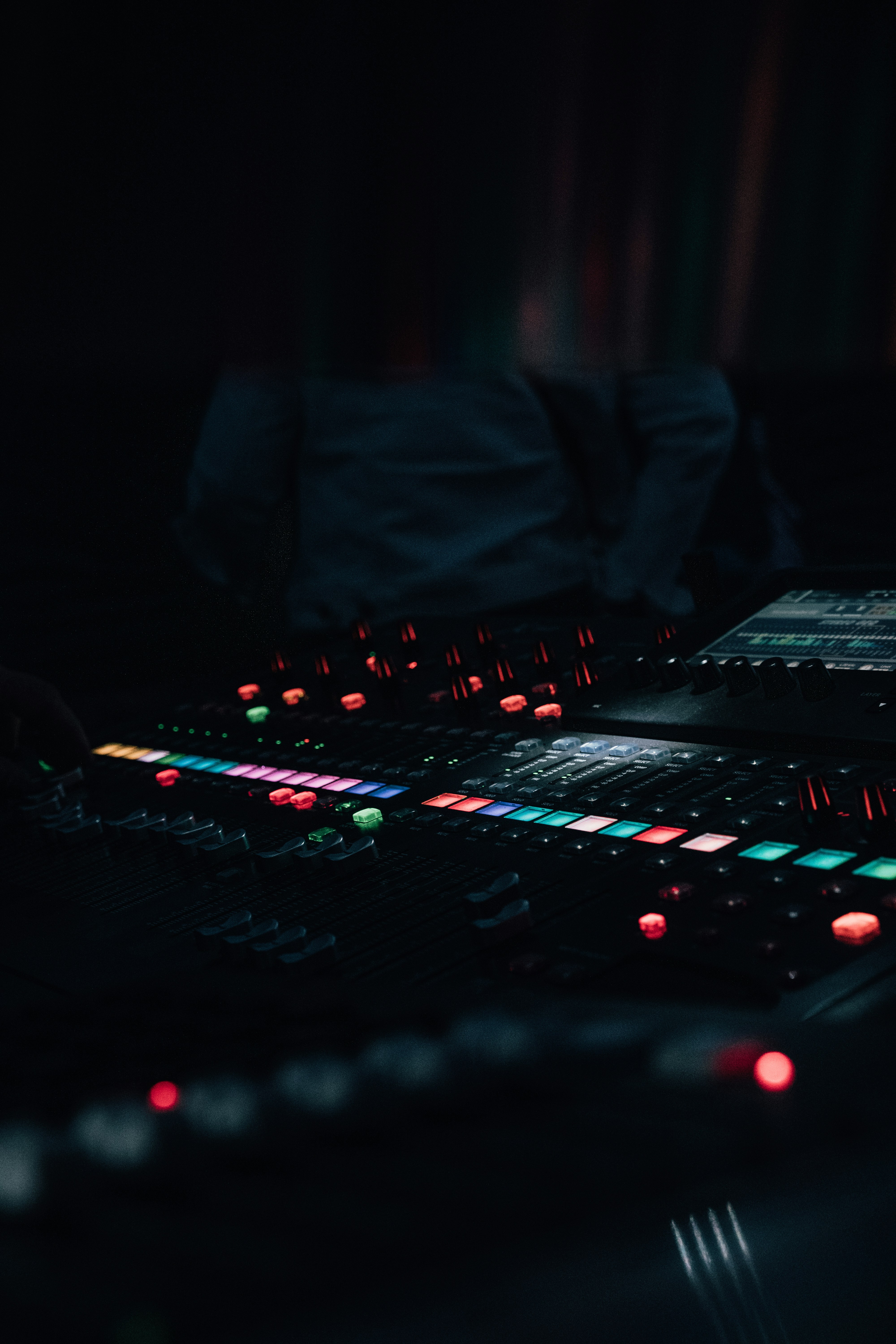 a person sitting on a dj turntable