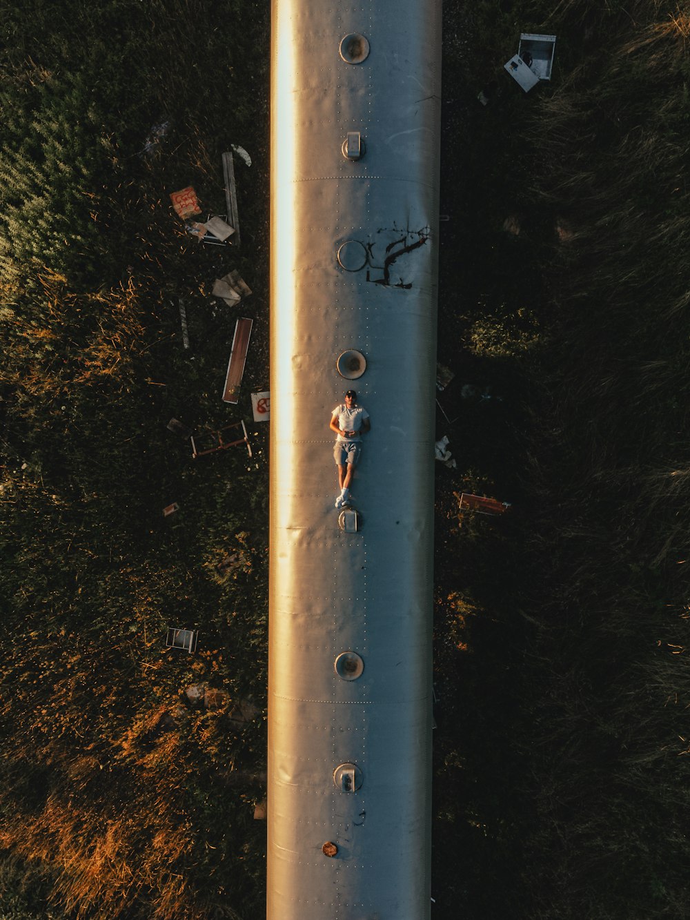 a person climbing a pole