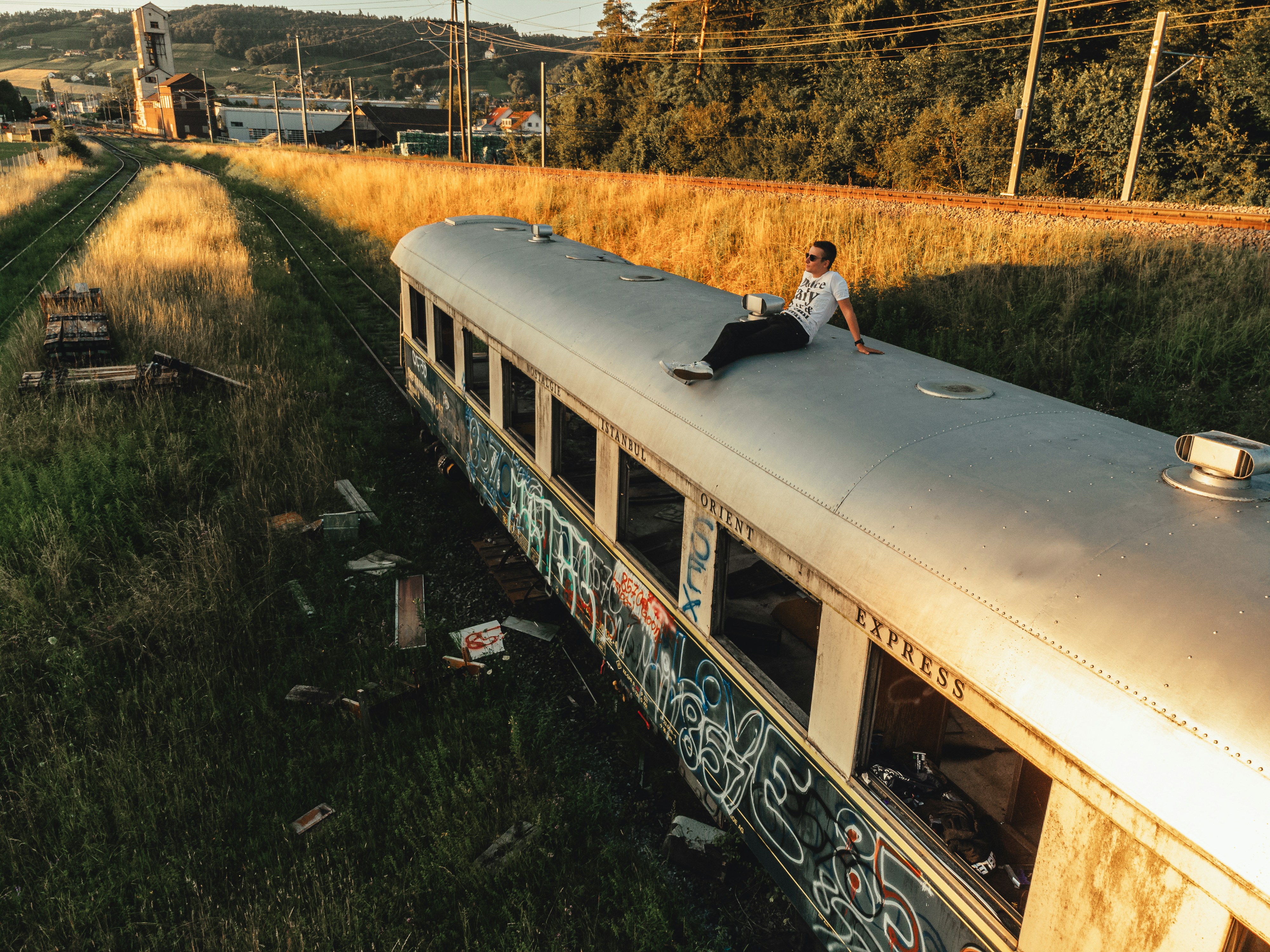 A person sitting on a train photo – Free Train Image on Unsplash