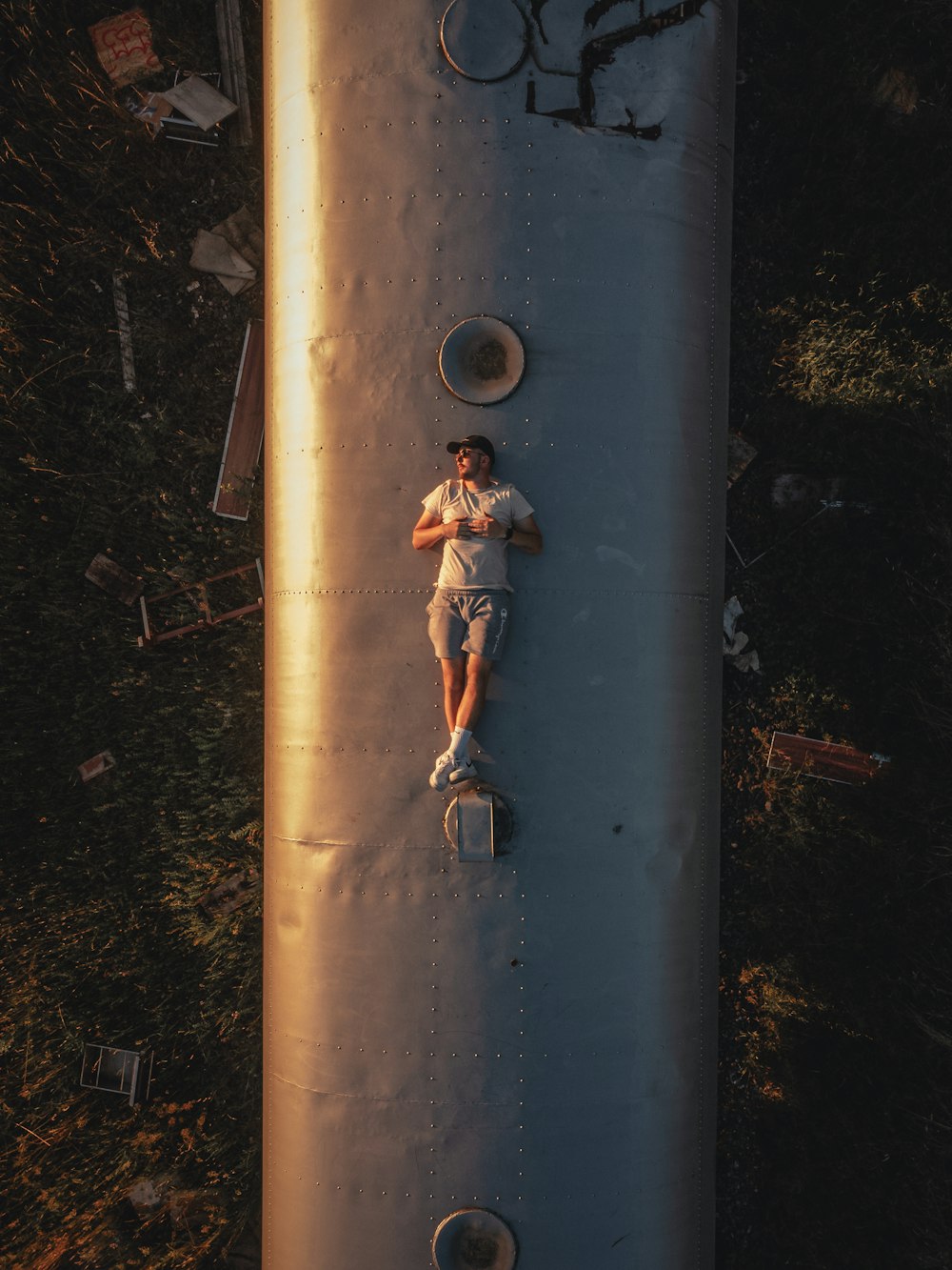 a person standing on a concrete wall