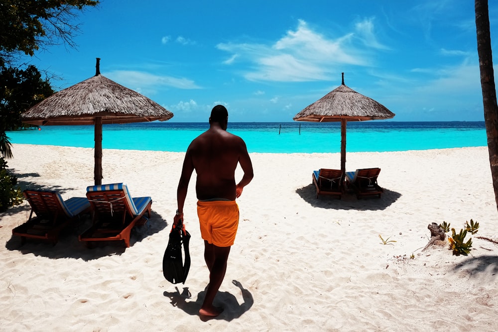 a person walking on a beach