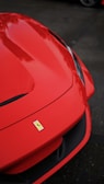a red car with a sticker on it