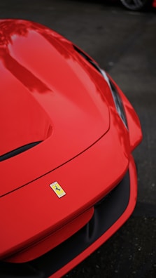 a red car with a sticker on it