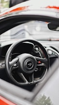 a steering wheel and dashboard of a car