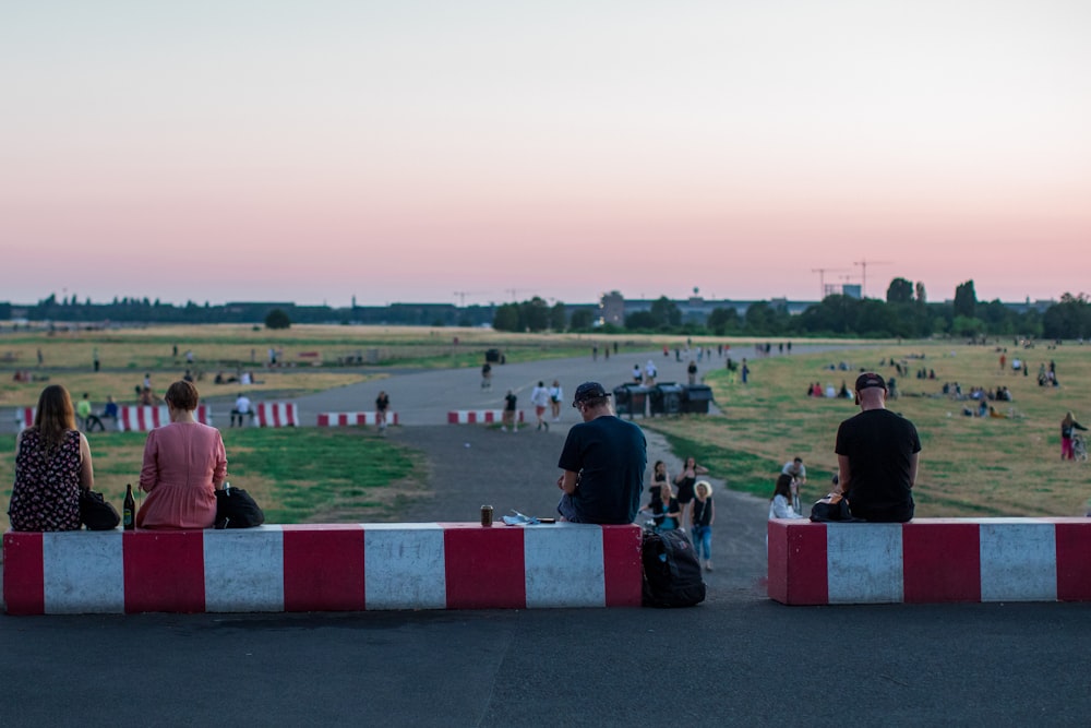 people sitting on a bench