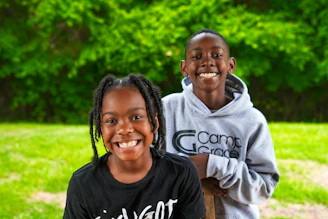 a man and a woman smiling