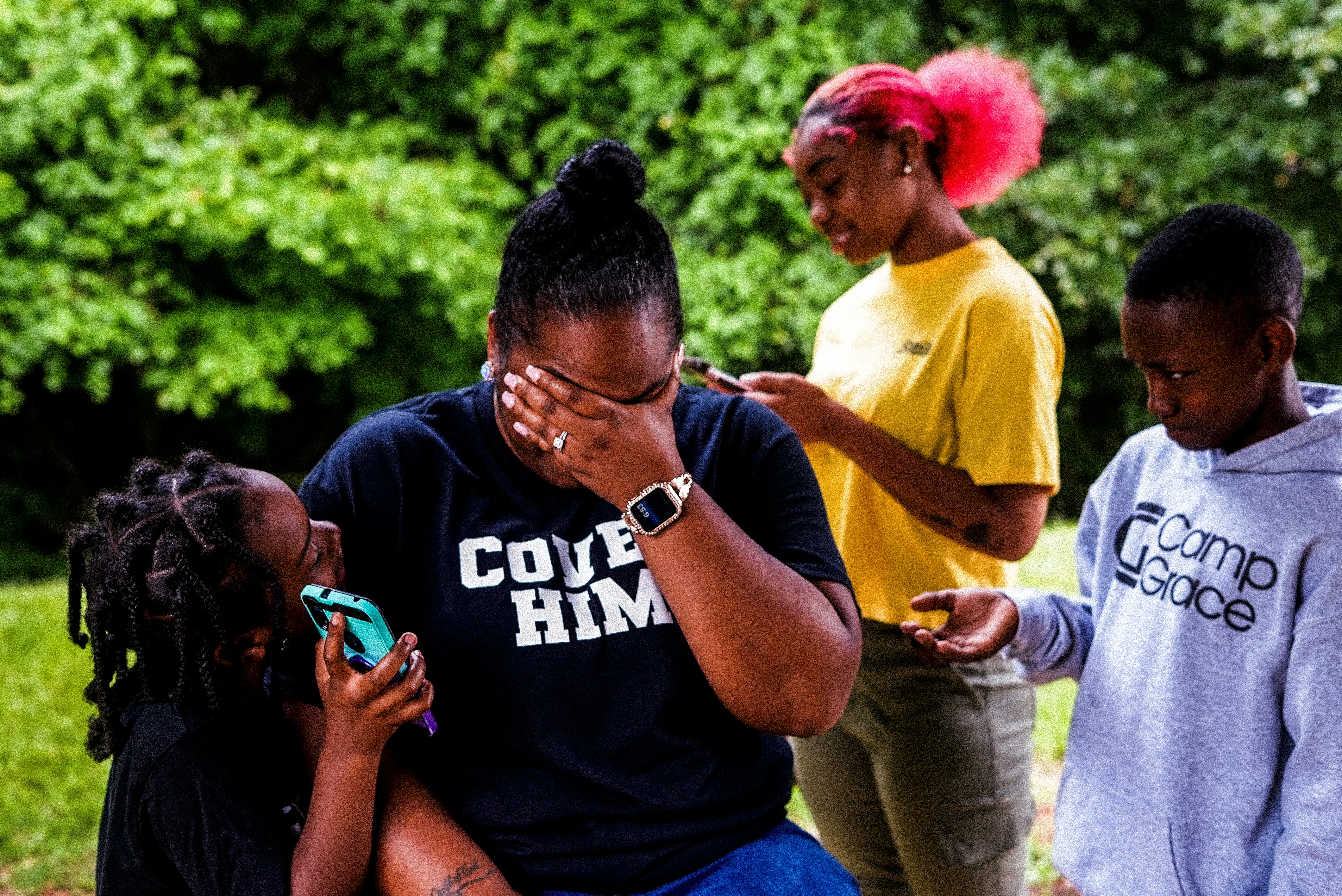 a group of people standing outside (Photo by Anthony McKissic on Unsplash)