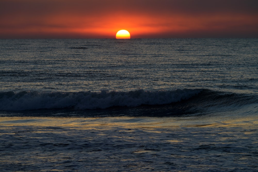 a sunset over the ocean