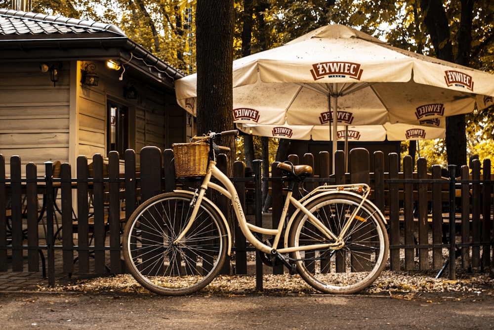 a bicycle is parked under a canopy
