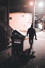 a man walking down a sidewalk