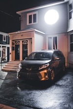 A modern Bay Area home with a newly installed concrete driveway featuring curved edges.