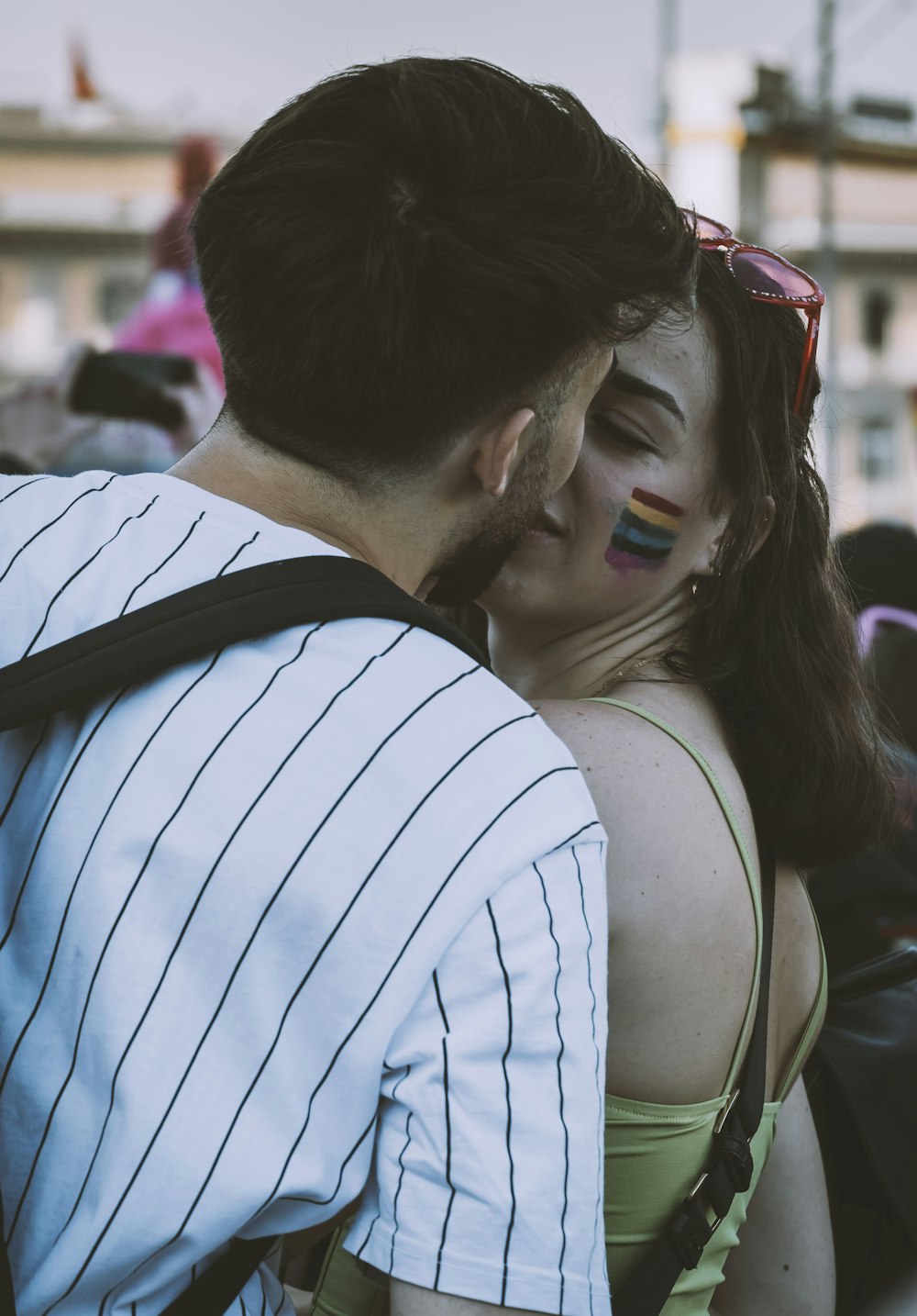 a man and woman kissing