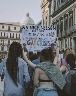 A group of young people leading a guided tour through the historic neighborhoods of Comuna 13.