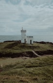 Elie, Fife a lighthouse on a hill by the water