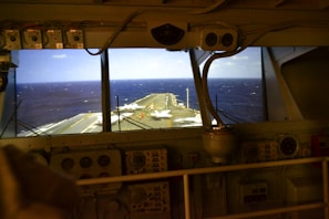 Wide-angle view of the logistics USA command center with multiple live-map screens displaying fleet routes.