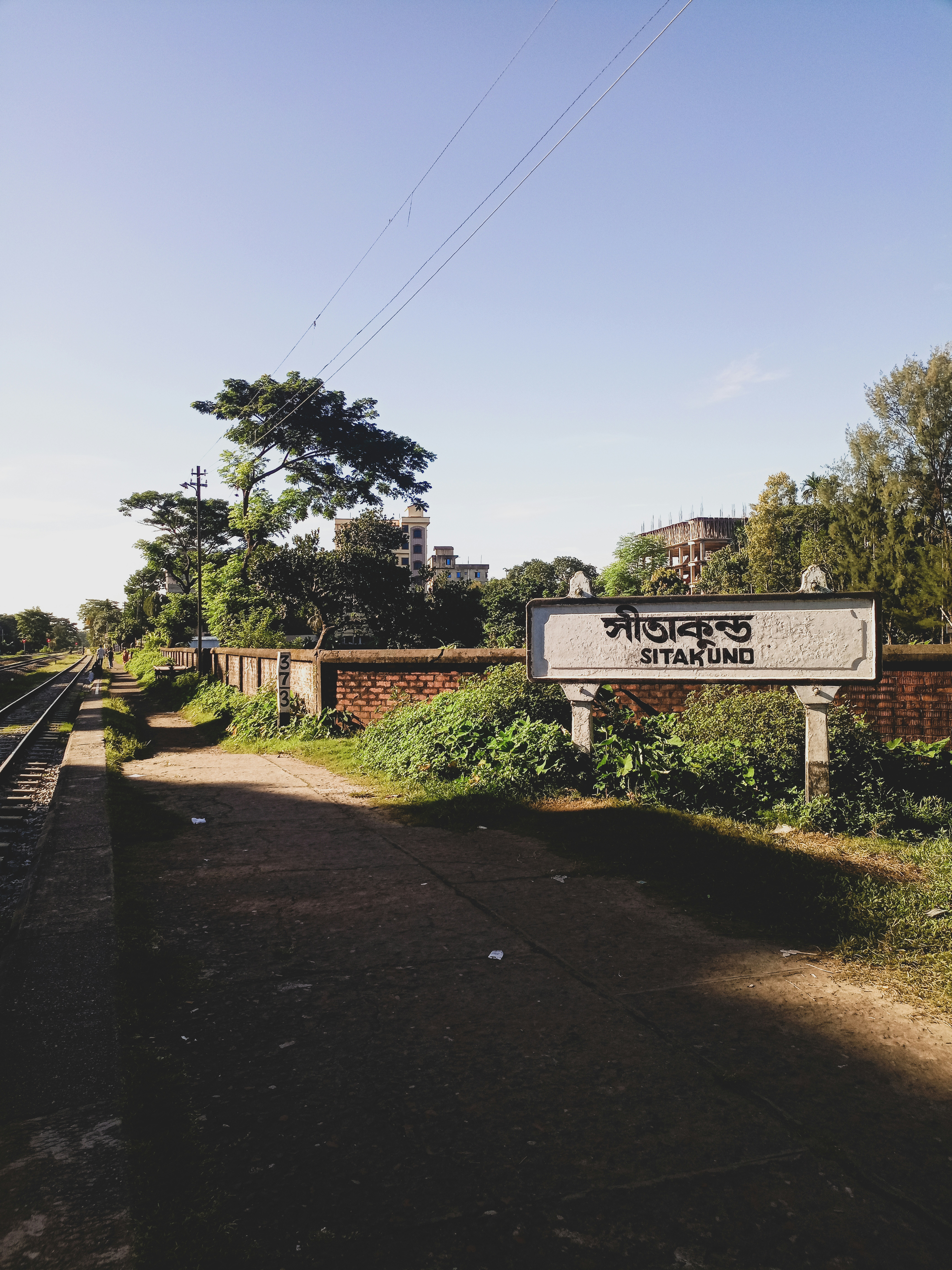 a sign on the side of a road
