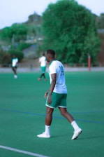 a boy in a blue shirt