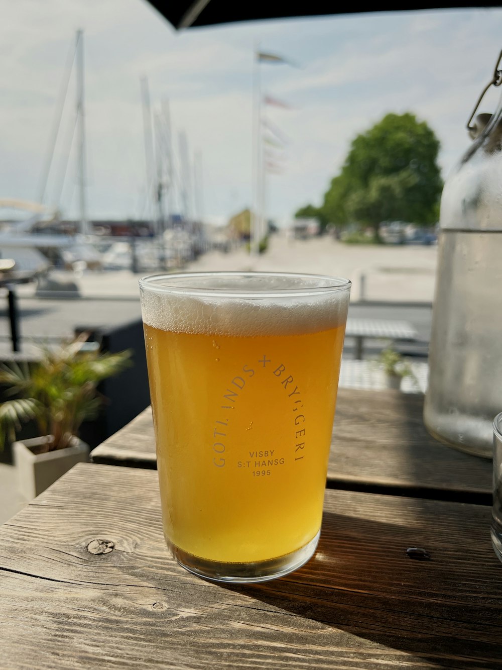 a glass of beer on a table