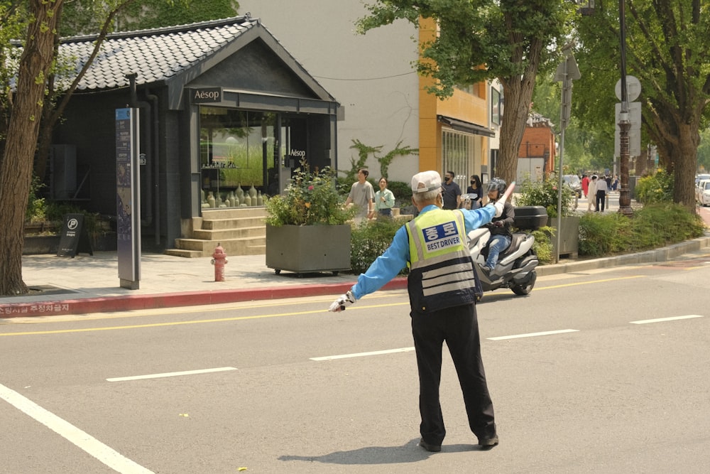 a police officer standing in the middle of the street