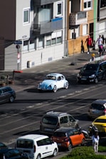 a group of cars parked on the side of a street