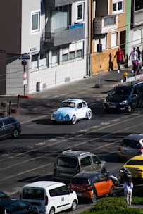a group of cars parked on the side of a street