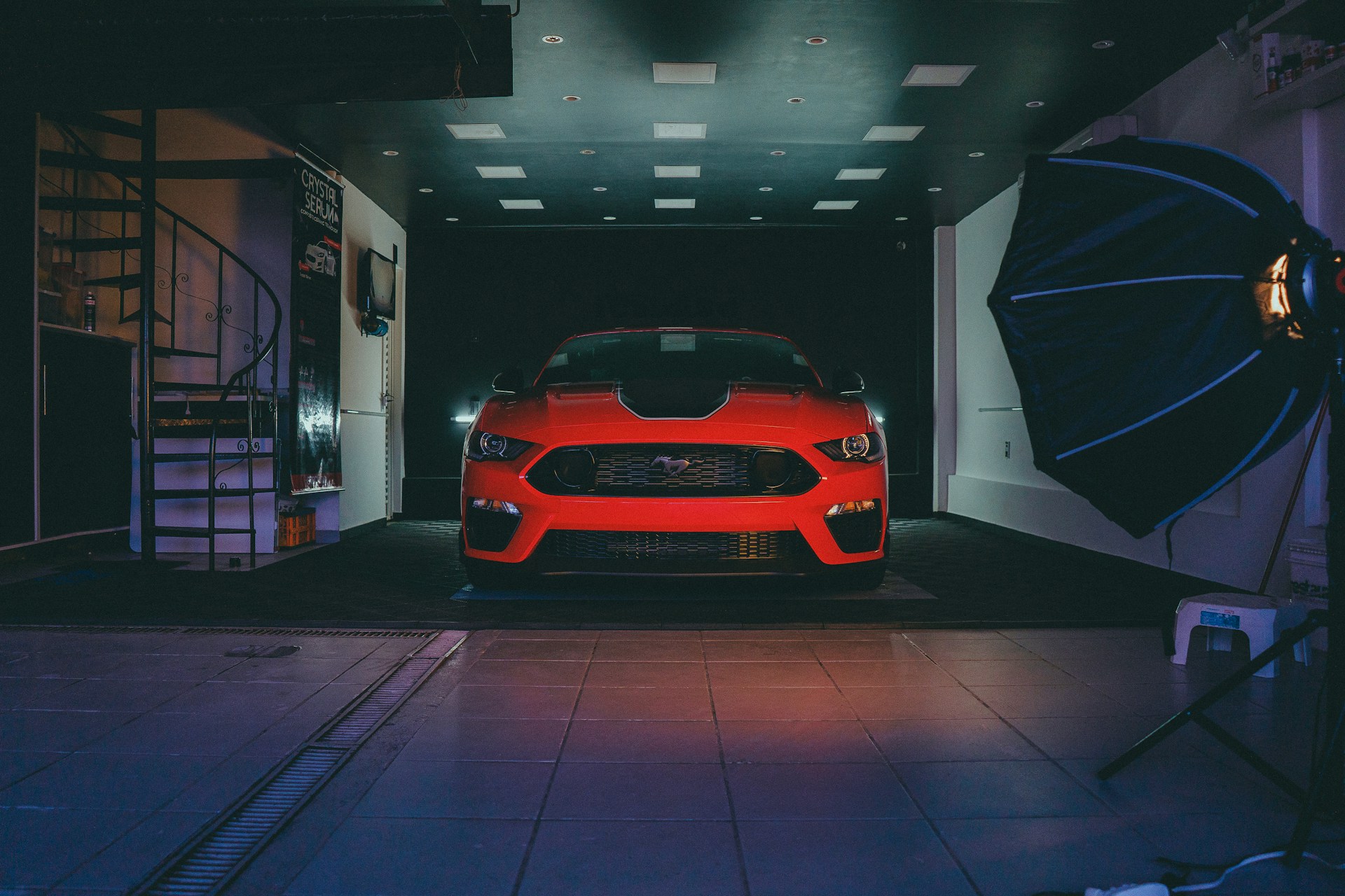 a red car parked in a building