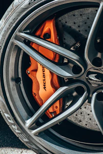 a close up of a tire and brake pads