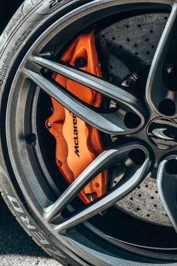 a close up of a tire and brake pads