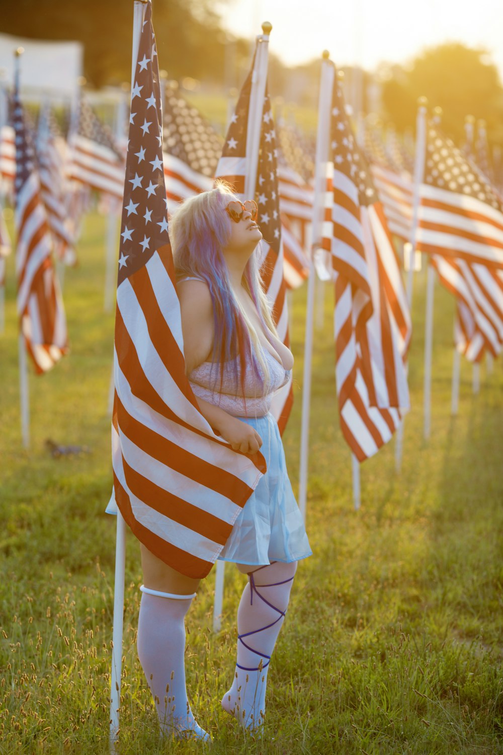 a person in a garment holding a flag