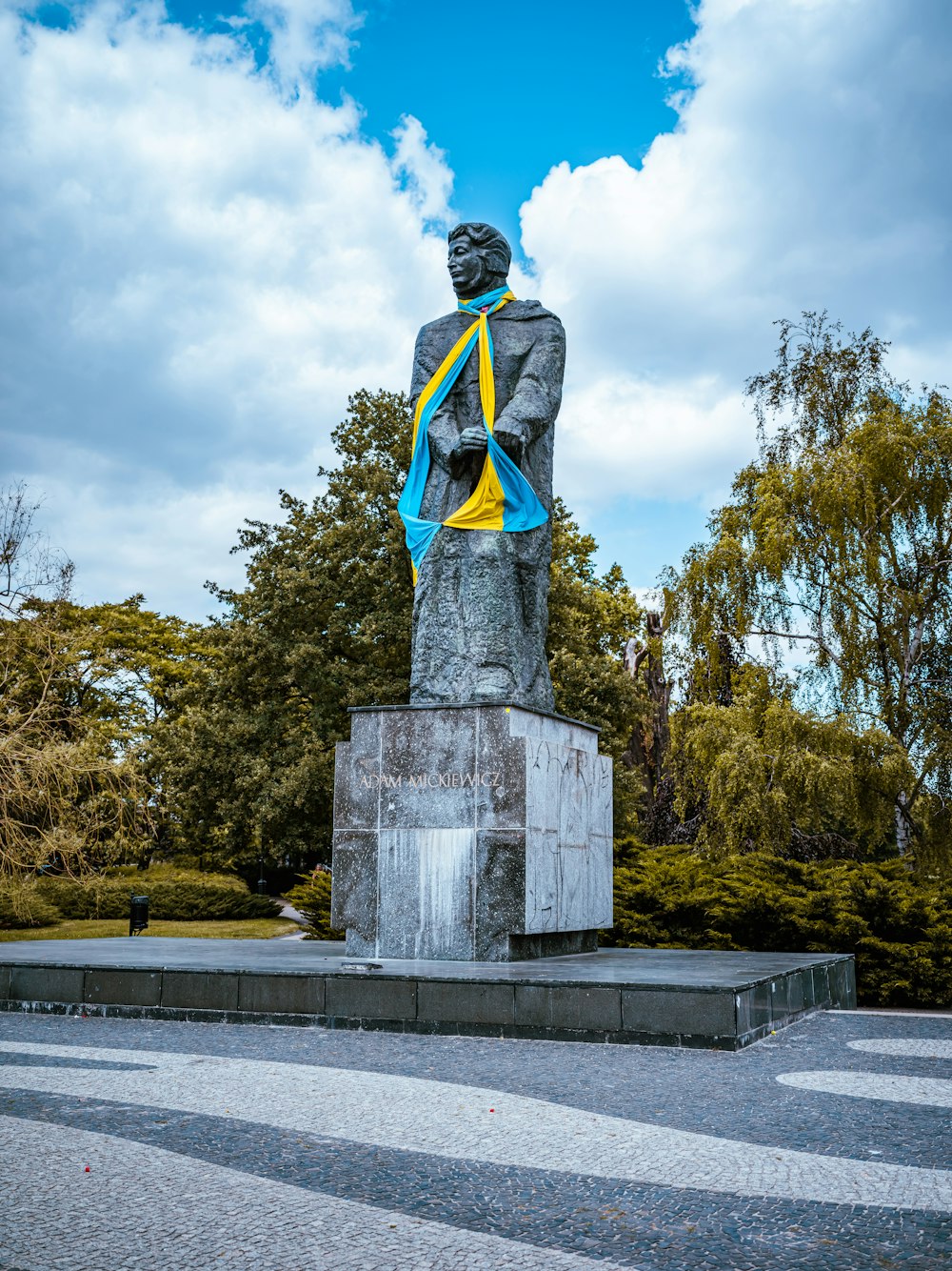 a statue of a man holding a gun