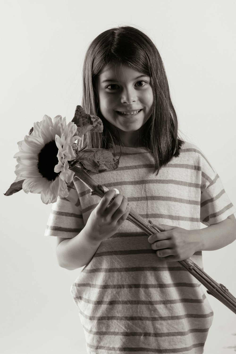 a person holding a flower